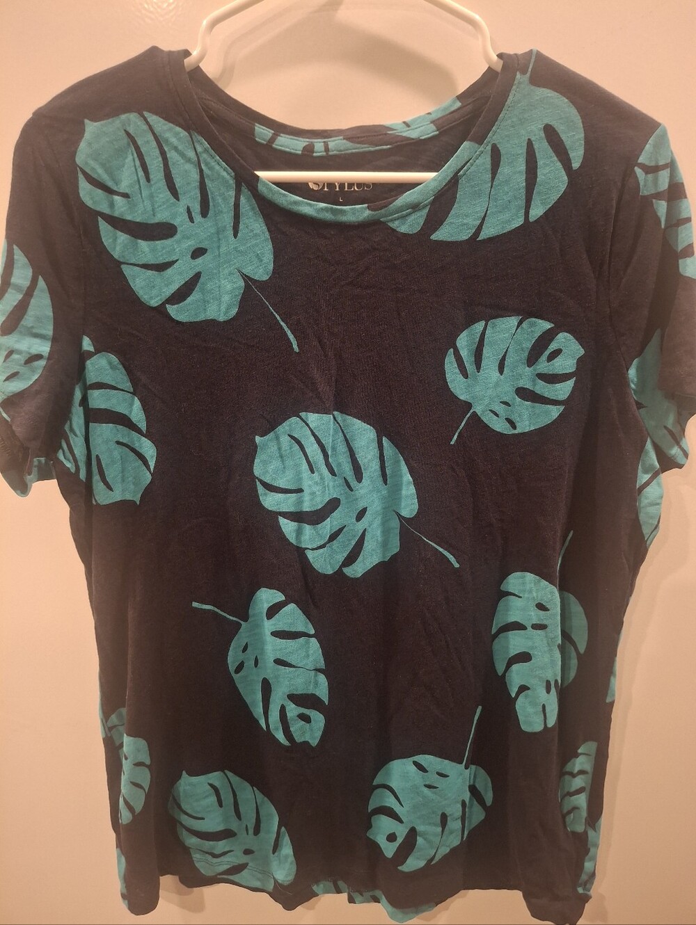 STYLUS Black Tee with Teal Leaf Motif